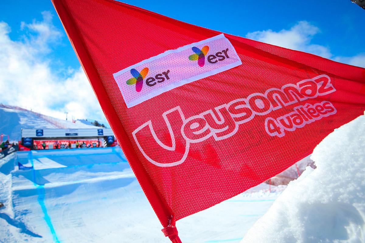 a snow slope and a Veysonnaz flag