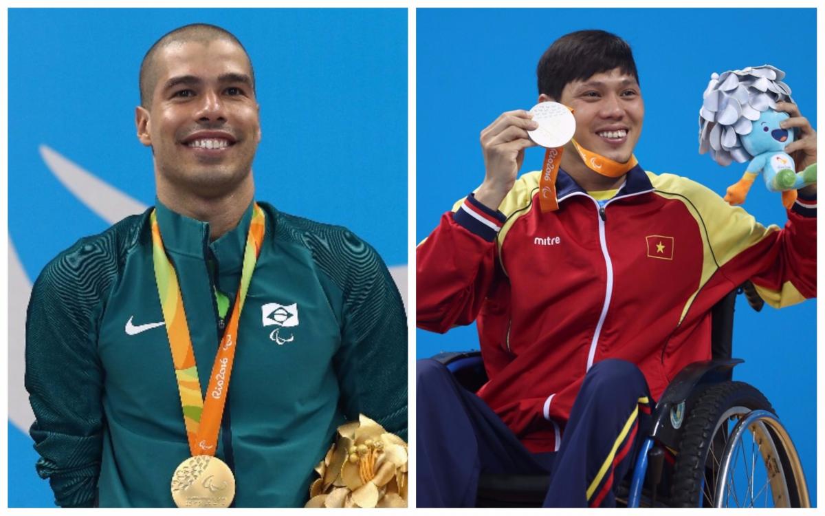 two male Para swimmers smile on the podium