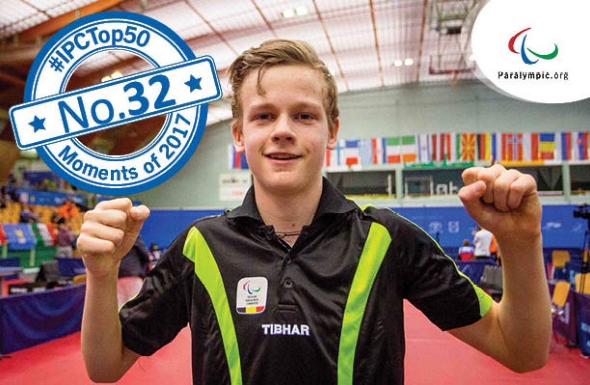 a male Para table tennis player gives a thumbs up to the camera