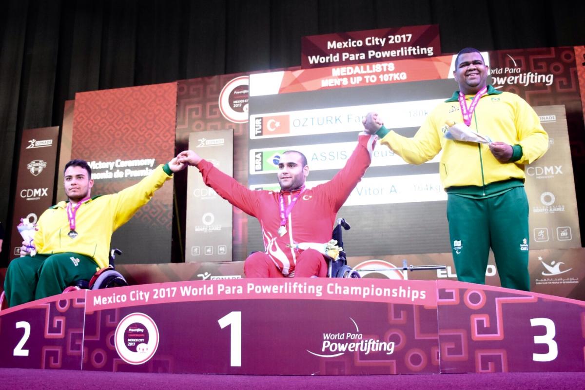 Faruk Ozturk - Junior Worlds three male powerlifters on the podium