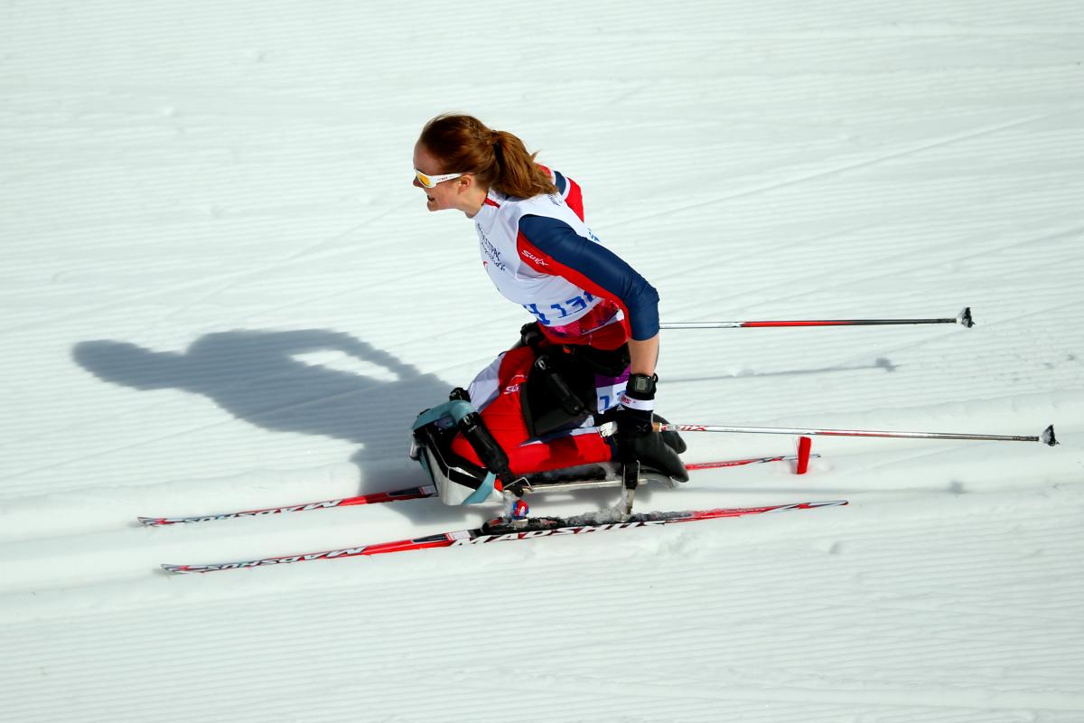 a female Para Nordic skier on the snow