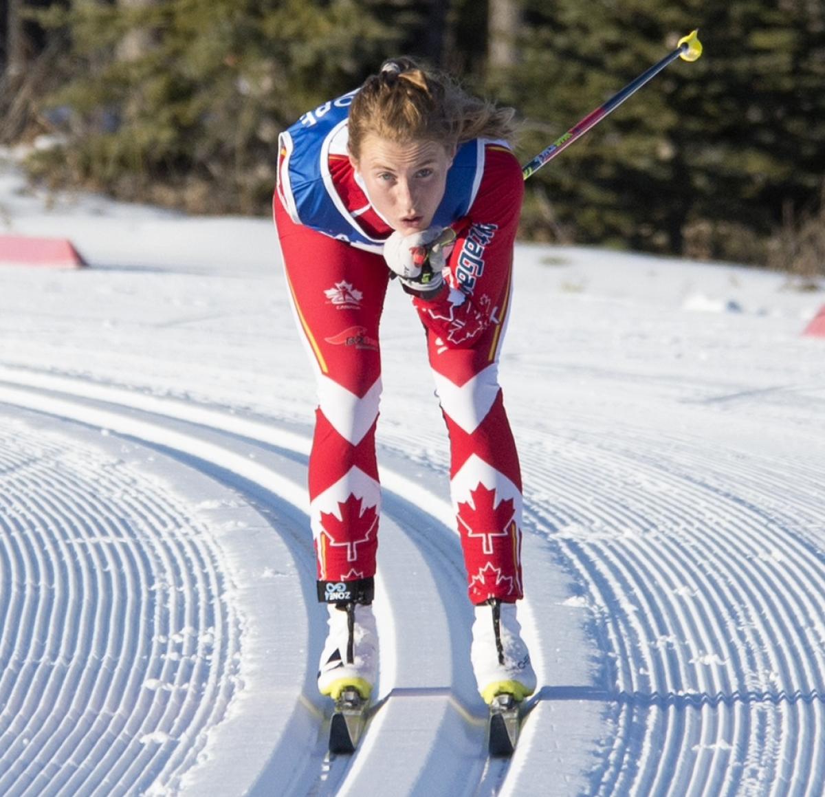 Emily Young - Canmore 2017 a female Para Nordic skier on the snow