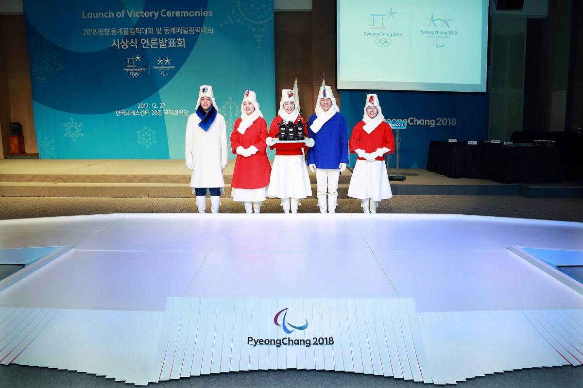 The podium and medal presenters look was revealed in December 2017 by PyeongChang 2018.