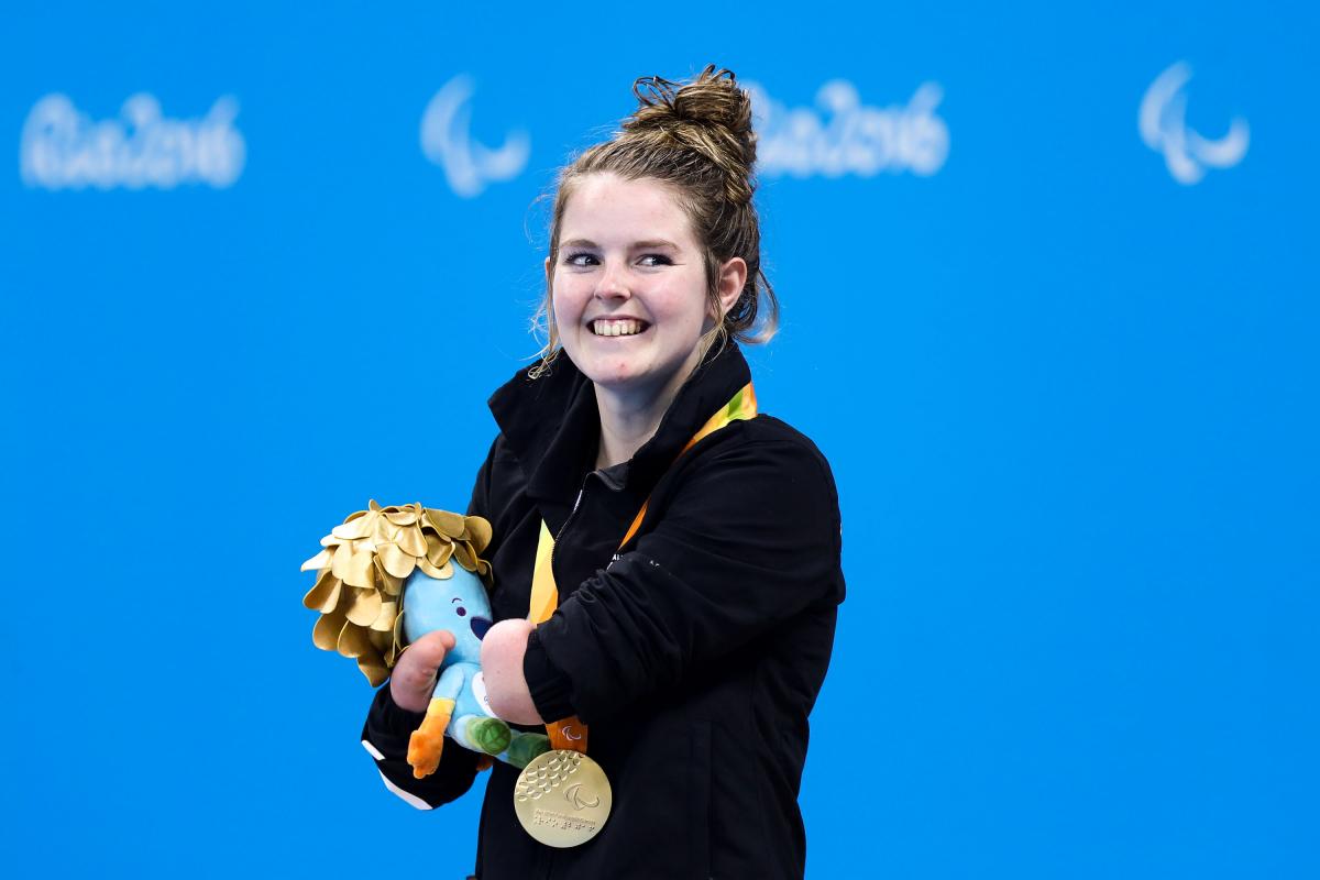 Nikita Howarth - Rio 2016 a Para swimmer smiles with her gold medal on the podium