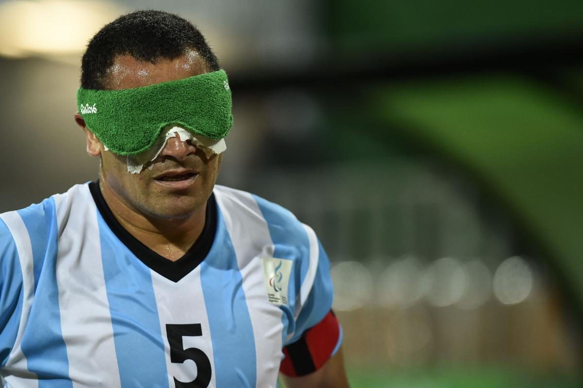 a male blind footballer