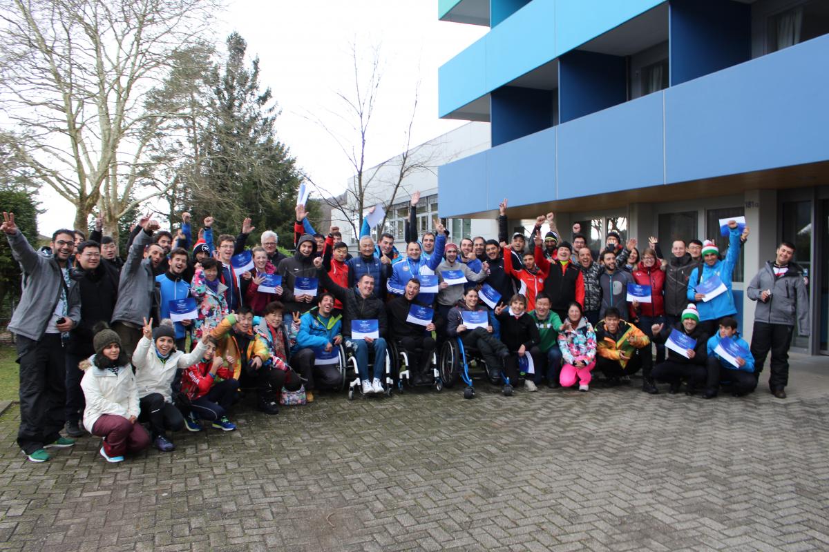 Around 50 participants of Nordic Development Camp pose for pictures in front of FT Hotel in Oberried