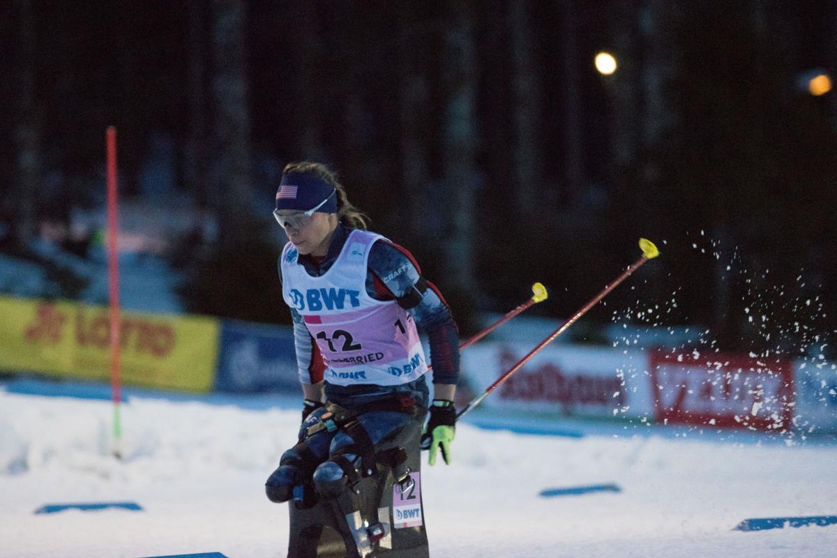 a female sit skier on the snow