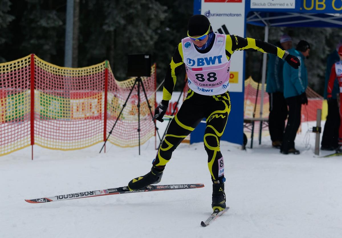 Ihor Reptyukh - Oberried 2018 A male Para Nordic skier sprints towards the finish line