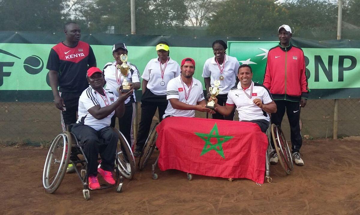 Morocco and Kenya - Africas World Team Cup qualification a group of wheelchair tennis players with their trophies