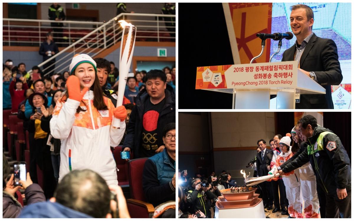 Paralympic Flame Gangneung people carrying a torch and lighting a flame