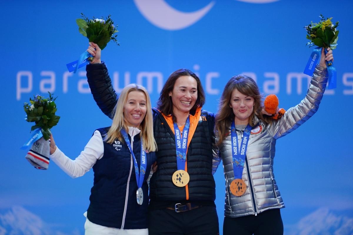 Sochi 2014 snowboard three female Para snowboarders on the podium