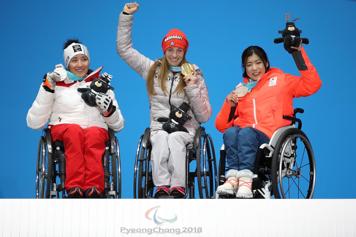 Claudia Loesch - PyeongChang 2018 three female sit skiers on the podium with their medals