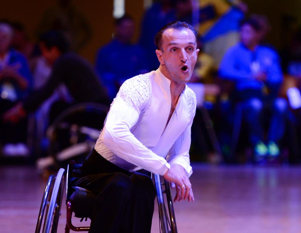 a male wheelchair dancer mid-move