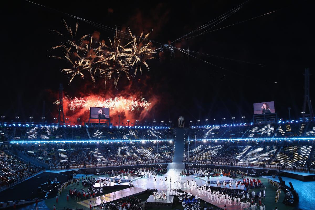 PyeongChang 2018 Closing Ceremony a stadium with fireworks exploding above it