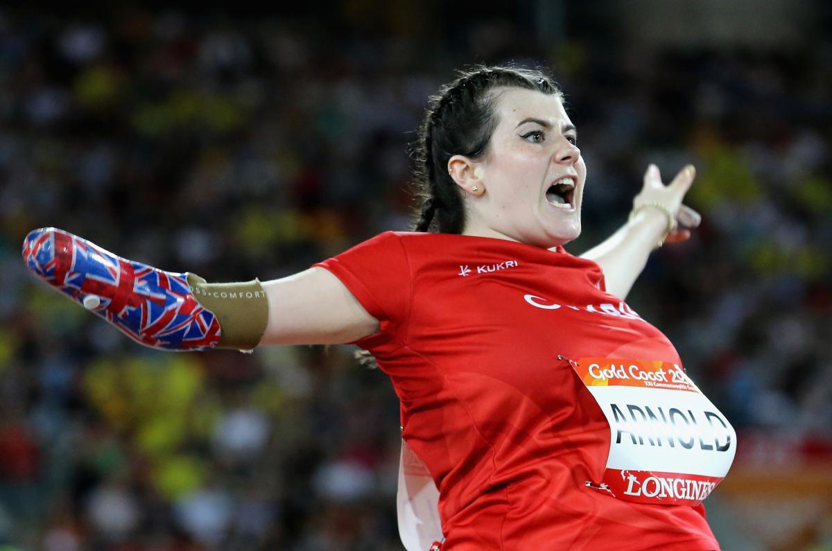 Hollie Arnold - Gold Coast 2018 a female thrower screams as she throws her javelin