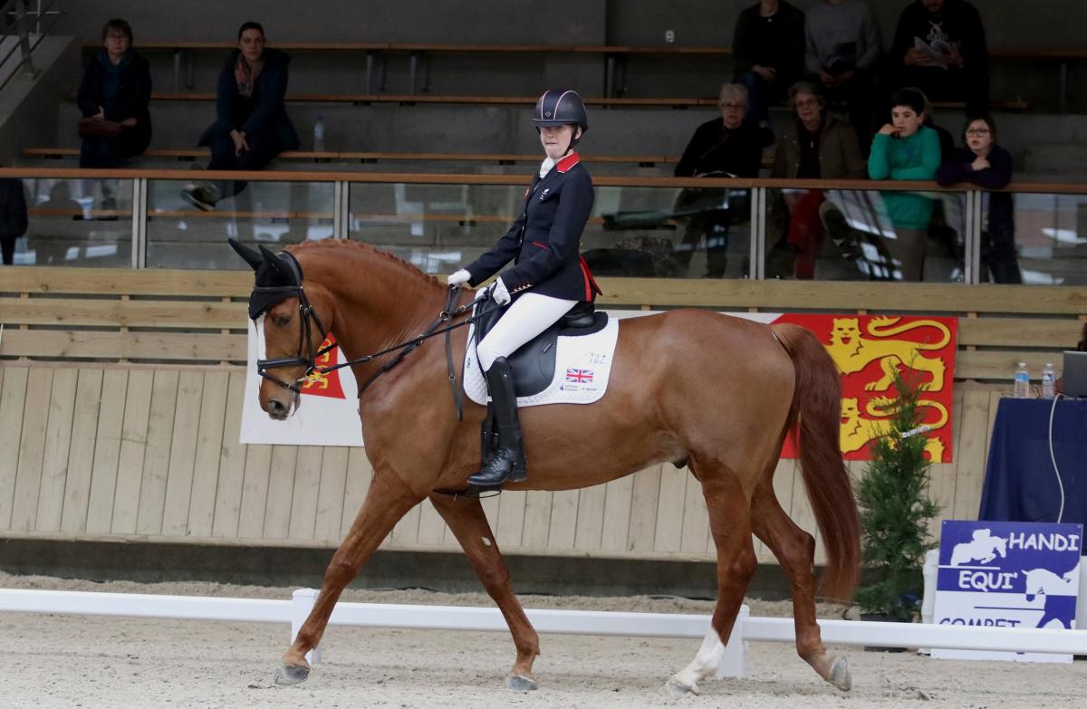 a female Para equestrian rider on her horse