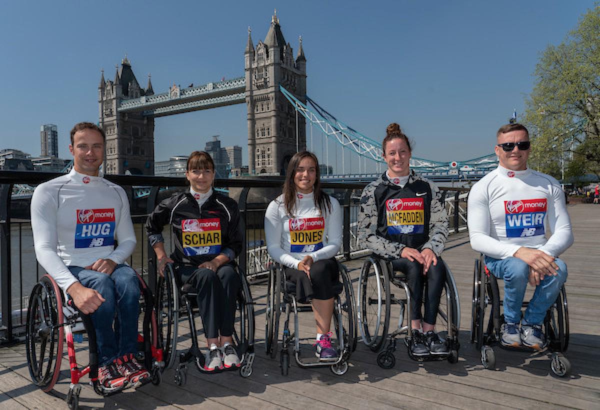 London Marathon 2018 - Hug, Schar, Jonas, McFadden and Weir Five athletes in wheelchairs pose for pictures with London's Tower Bridge behind them