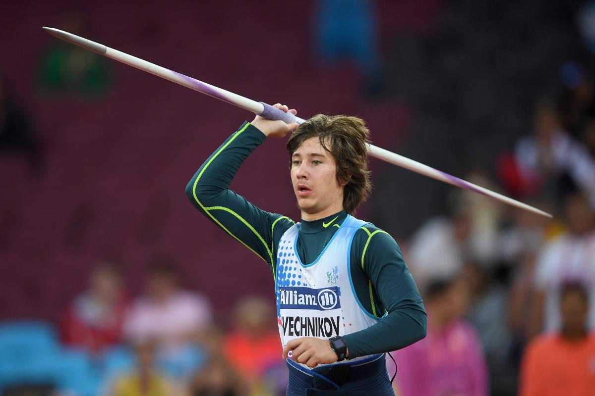 a male Para athlete throwing a javelin