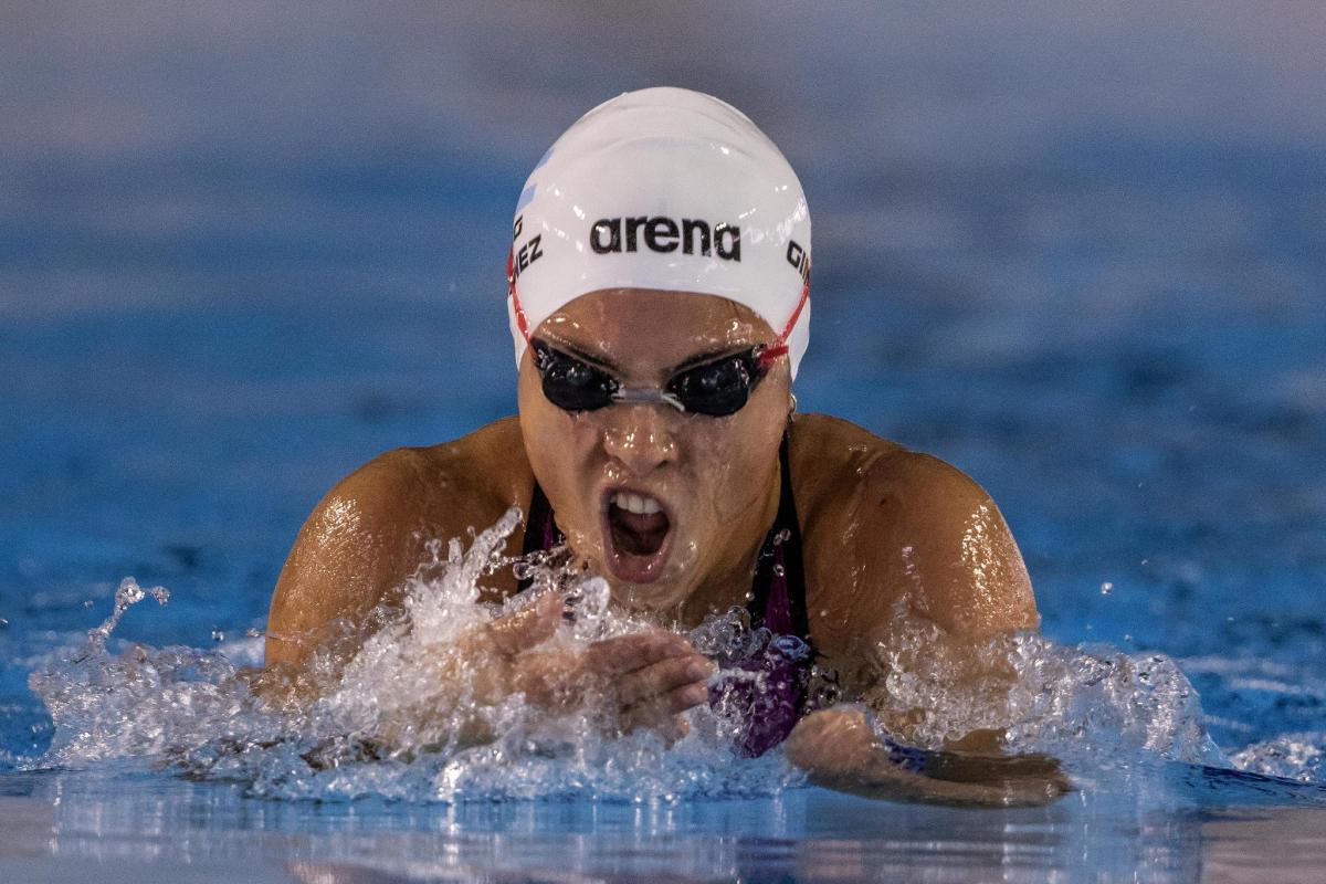 Daniela Gimenez - Sao Paulo 2018 a female Para swimmer comes out of the water to take a breath