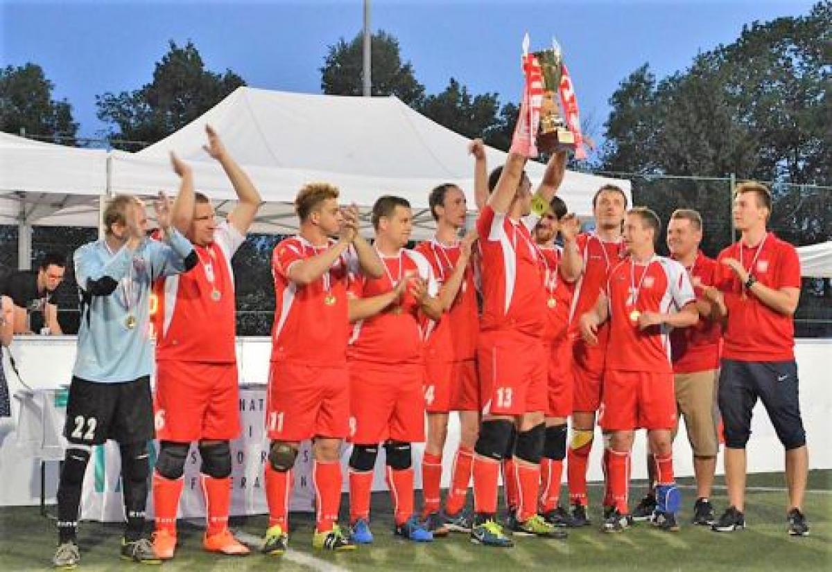 Poland's blind football team celebrates after winning the 2018 Euro Challenge title