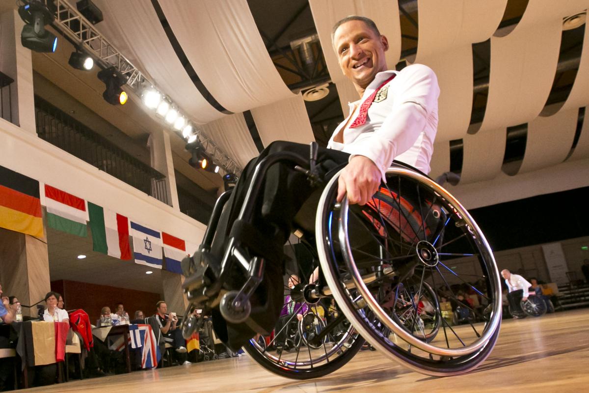 Man in wheelchair dancing