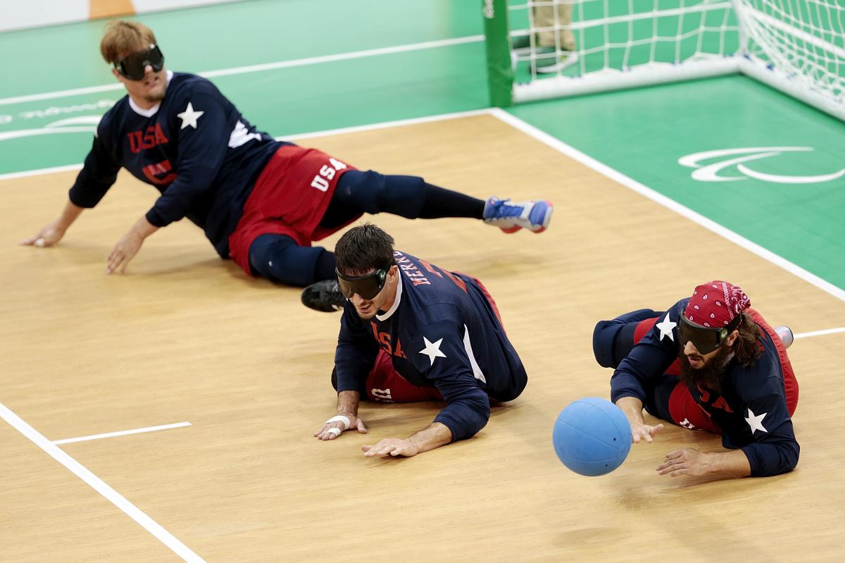 USA goalball - collage a male and female goalball player dive to save a shot