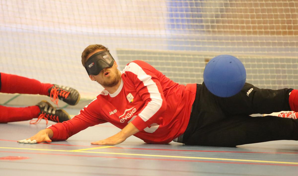 Belgium men goalball - Malmo 2018 a male goalball player saves a shot