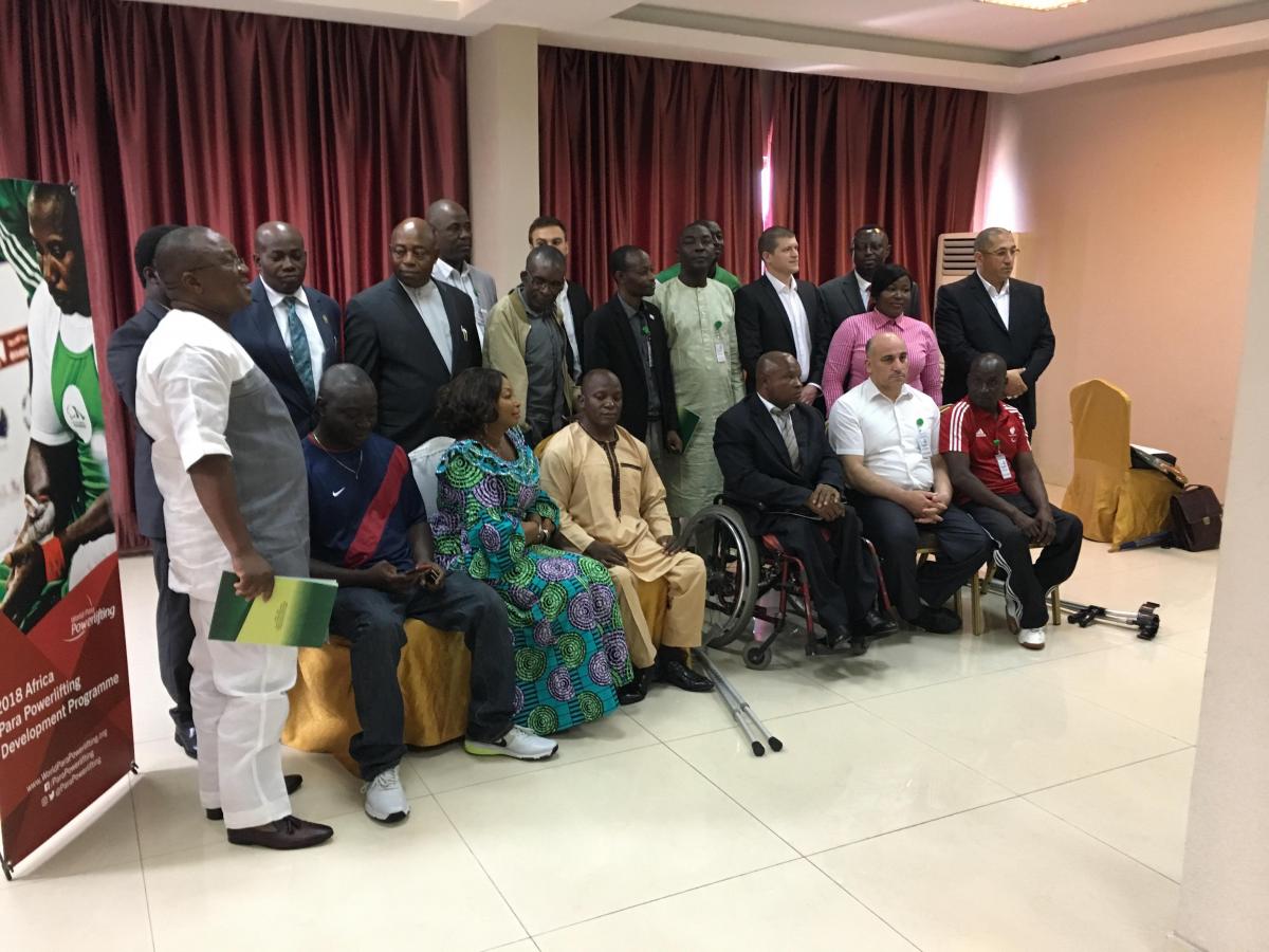 Nigeria powerlifting workshop a group of men and women sitting and standing