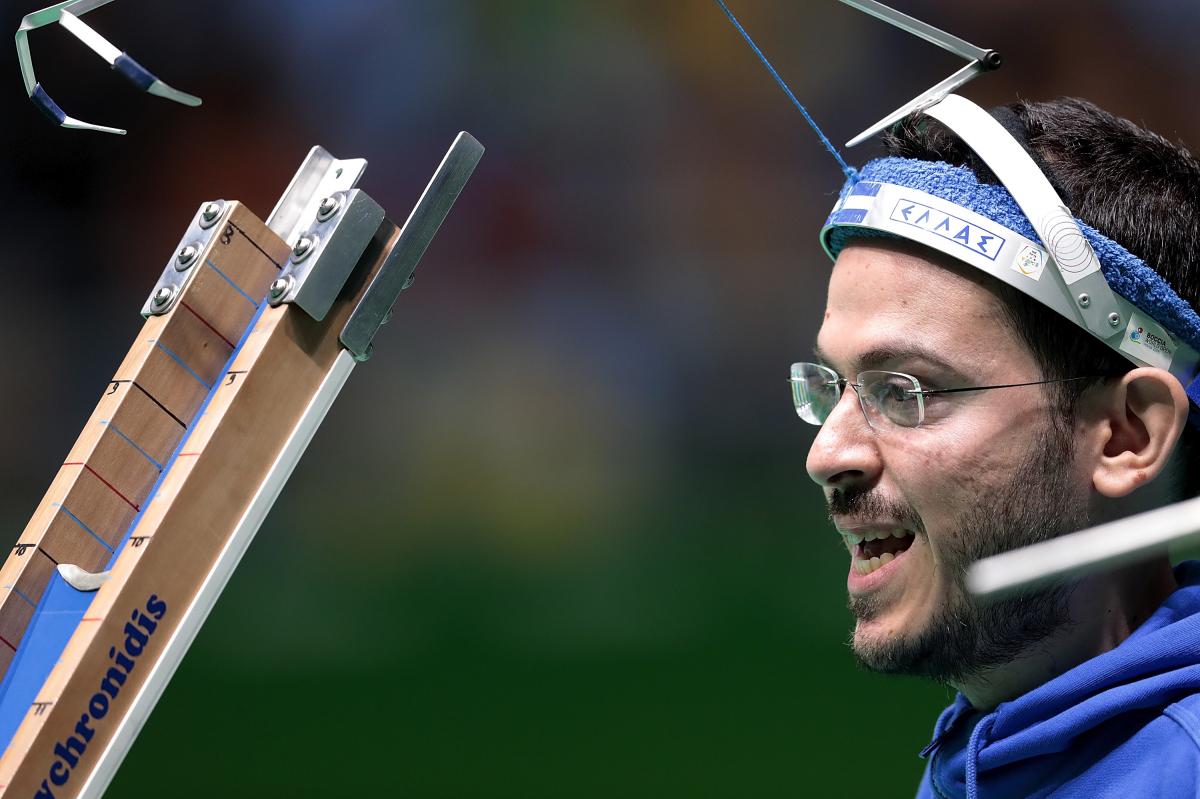 Greg Polychronidis - Rio 2016 a male boccia player prepares to play a ball