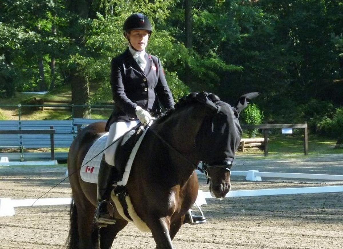 Woman riding a horse