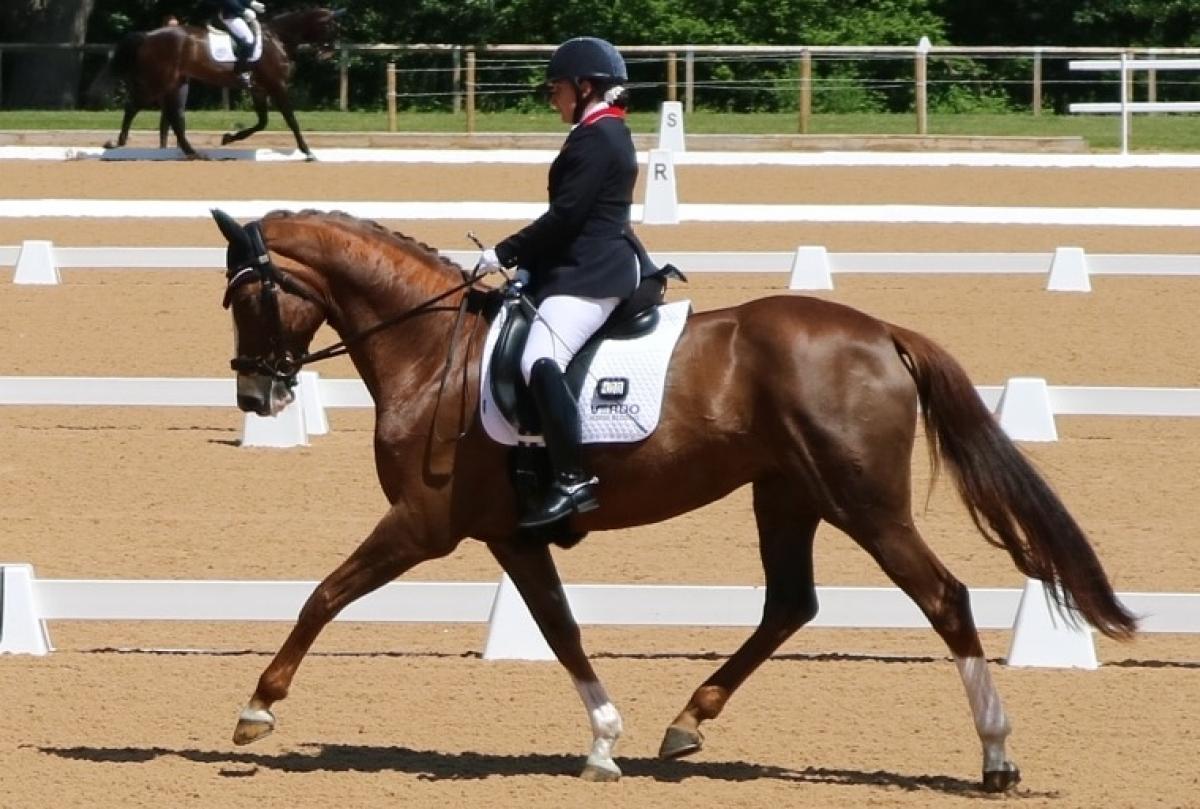 Natasha Baker on Diva - equestrian a female Para equestrian rider on a horse
