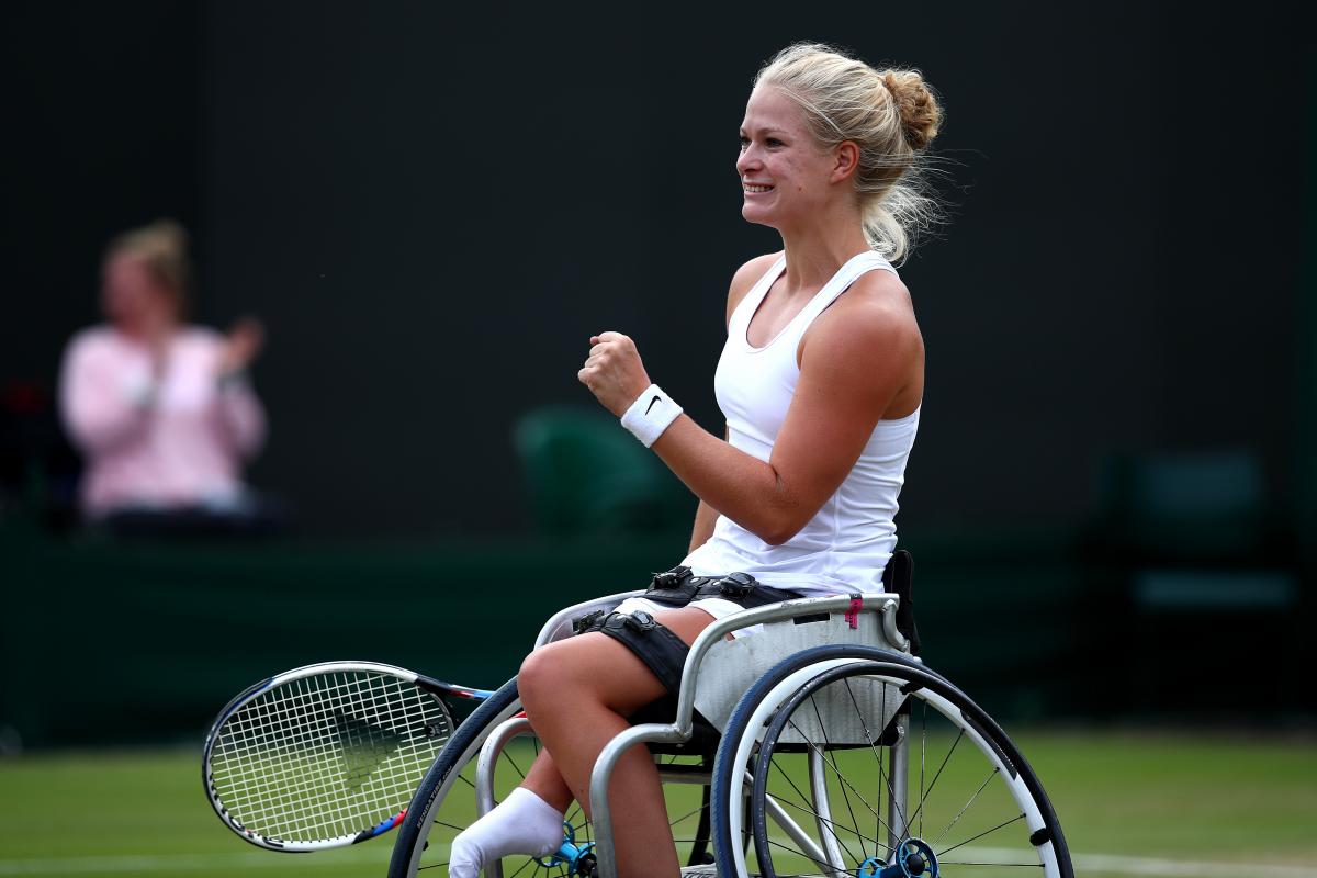 Diede de Groot - Wimbledon female wheelchair tennis player Diede de Groot plays a shot on grass