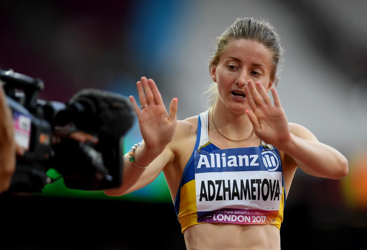 Leilia Adzhametova - Ukraine - London 2017 Woman waves to a TV camera