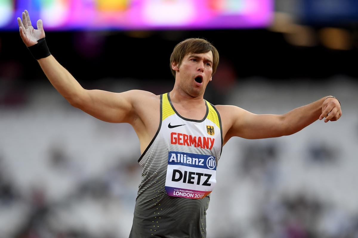male Para athlete Sebastian Dietz reacts to throwing a shot put