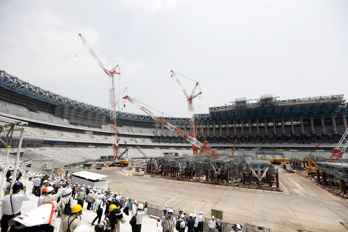 a wide shot of the Tokyo 2020 Olympic Stadium under construction