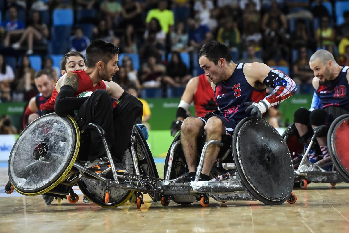 male wheelchair rugby player Trevor Hirschfeild collides on court with a US male player 