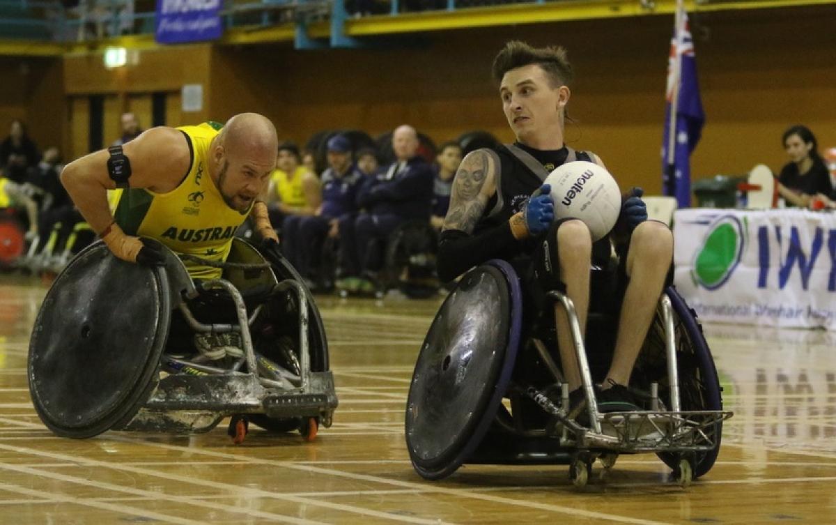 Cody Everson - NZ wheelchair rugby male wheelchair rugby player Cody Everson takes the ball away from another player