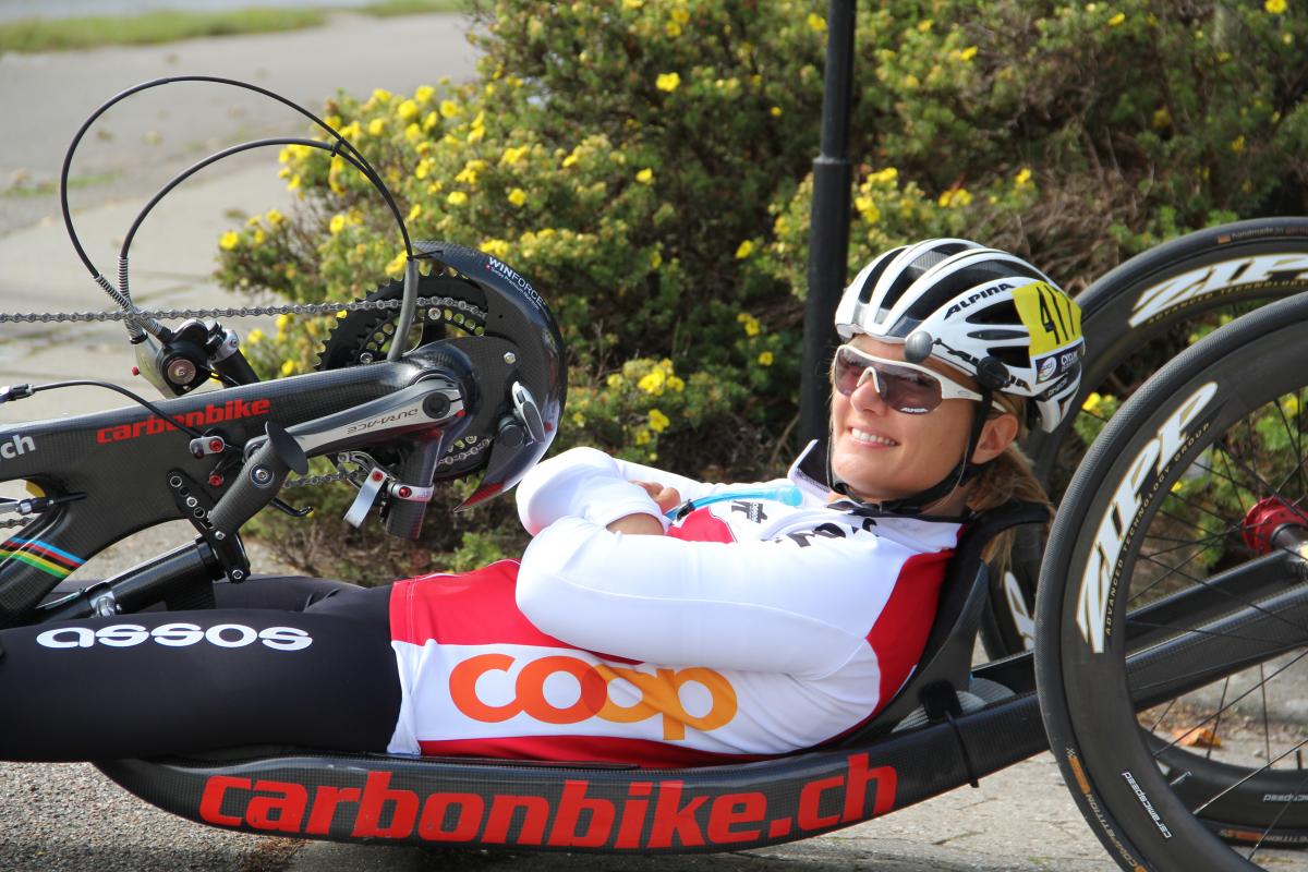 Ursula Schwaller female Para cyclist Ursula Schwaller using a hand bike on the road