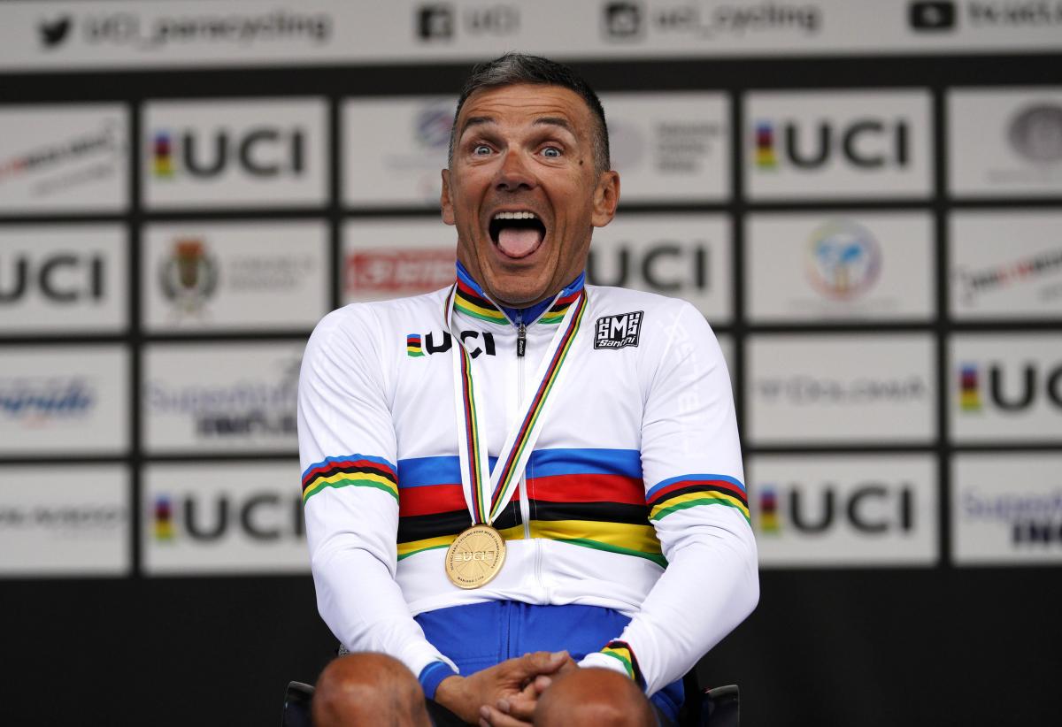 Fabrizio Cornegliani - Italy - cycling Fabrizio Cornegliani celebrates on the podium with a big smile