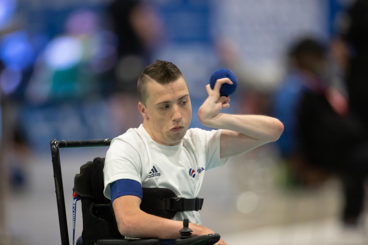 male boccia player David Smith plays a shot