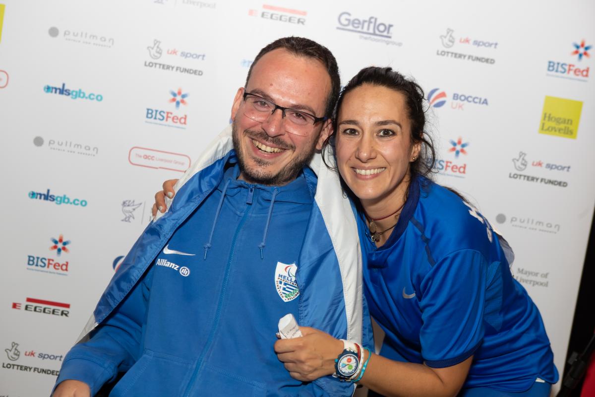 male boccia player Greg Polychronidis with wife and assistant Katerina 