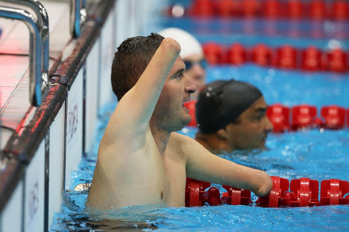 Zsolt Vereczkei male Para swimmer Zsolt Vereczkei raises his arm in the water