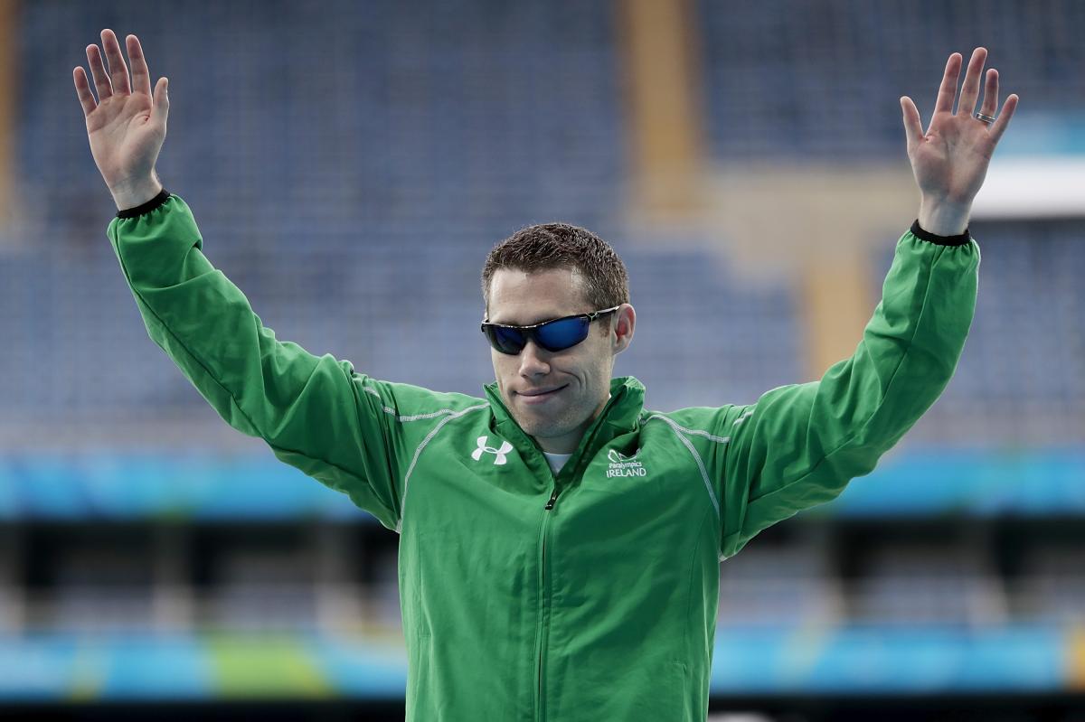 Para athlete Jason Smyth raises his arms