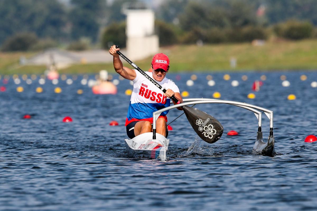 female Para canoeist Larisa Volik takes a stroke