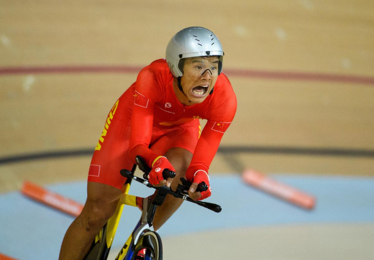 male Para cyclist Li Zhangyu goes round the bend on his bike