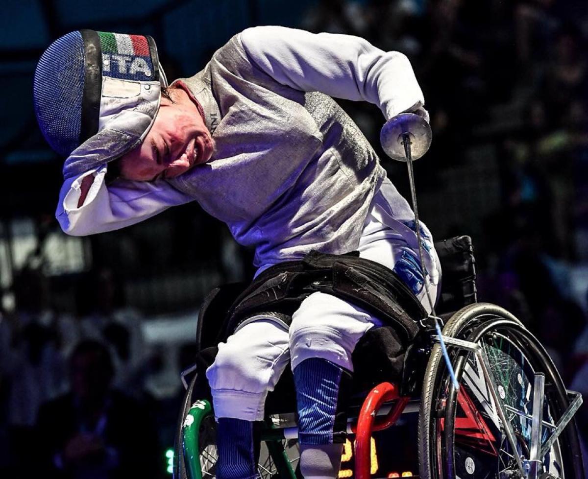 Bebe Vio - Italy - wheelchair fencing Italian female wheelchair fencer takes off her mask after a win