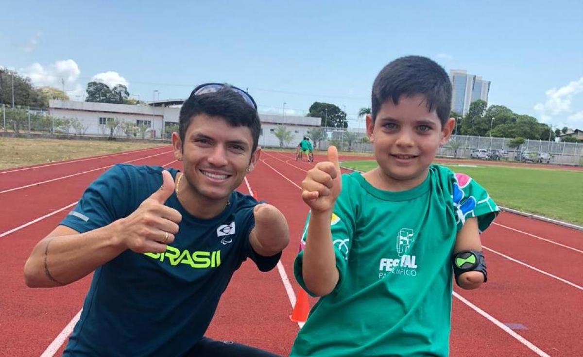 Petrucio Ferreira and Rian Mendes - Brazil's 2018 Paralympic Festival Man and boy with an impairment in the left arm