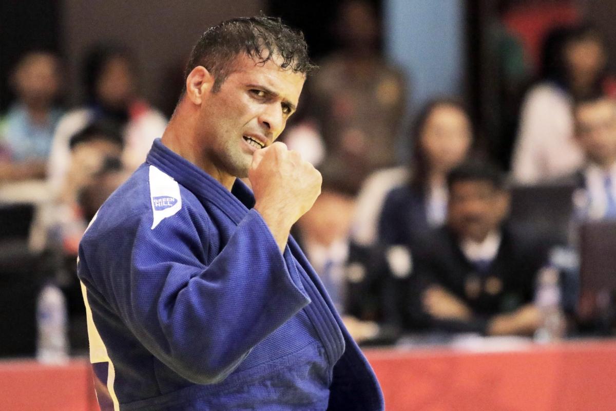 Ehsan Mousanezhad Karmozdi - Indonesia 2018 male judoka Ehsan Mousanezhad Karmozdi clenches his fist in victory