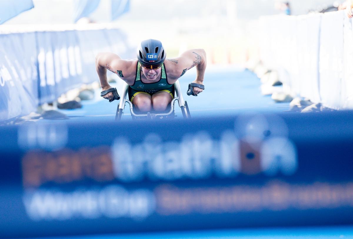 Woman in a racing wheelchair 