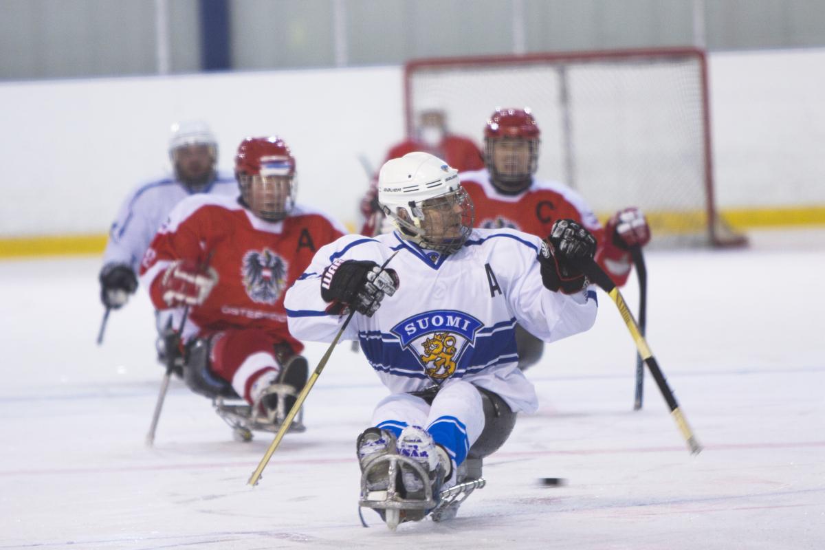 A man on a sledge hockey